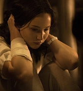 Jennifer Lawrence as Katniss Everdeen in Mockingjay Part 1
